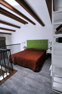 Säng eller sängar i ett rum på Hotel Marzia Holiday Queen