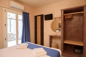 Posteľ alebo postele v izbe v ubytovaní Οasis Apartments