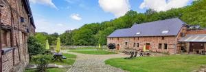 Zahrada ubytování B&B HOTEL IN FERME DE LEUZE nabij Durbuy, eigen laadpalen