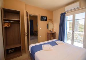 Posteľ alebo postele v izbe v ubytovaní Οasis Apartments