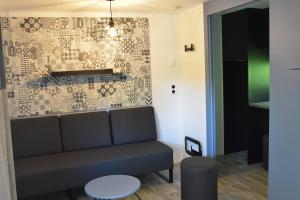 Posezení v ubytování Lodges du Sancy