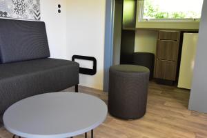 Posezení v ubytování Lodges du Sancy