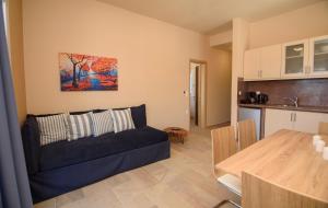 Kuchyňa alebo kuchynka v ubytovaní Οasis Apartments