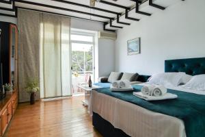 Posteľ alebo postele v izbe v ubytovaní Apartment Beach Makarska