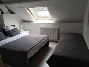 Postel nebo postele na pokoji v ubytování Appartements Bon Secours