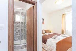 Postel nebo postele na pokoji v ubytování Villa Cupido in Makarska, private pool