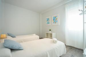 Posteľ alebo postele v izbe v ubytovaní CASANA APARTAMENT CITY CENTER
