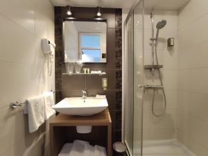 Koupelna v ubytování Hotel Korsal