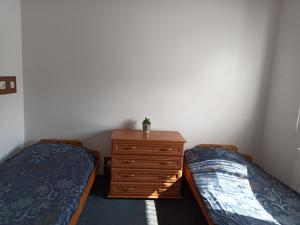 Postel nebo postele na pokoji v ubytování Gościniec Silver