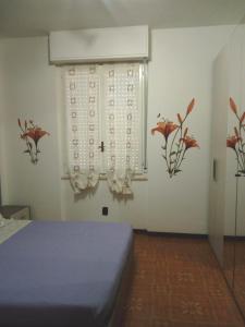 A bed or beds in a room at AndEli DUE