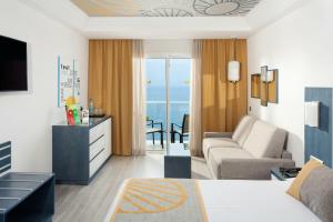 TV a/nebo společenská místnost v ubytování Hotel Riu Vistamar Gran Canaria - All Inclusive