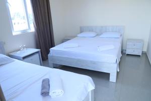 Ένα ή περισσότερα κρεβάτια σε δωμάτιο στο Hotel Estonia Two