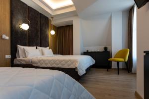 Grand Central Hotel客房内的一张或多张床位