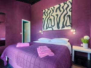 Łóżko lub łóżka w pokoju w obiekcie Villa Moira by Interhome