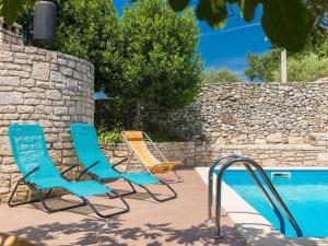 Bazén v ubytovaní Apartment Jasen by Interhome alebo v jeho blízkosti + 7 fotografií