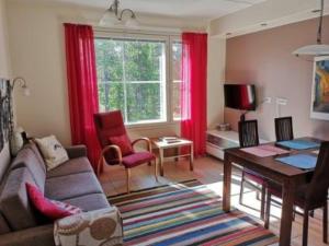 TV a/nebo společenská místnost v ubytování Holiday Home Yllästar 3 as 601 by Interhome