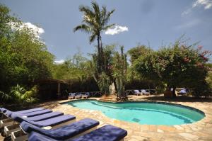 Bazén v ubytování Fig Tree Camp - Maasai Mara nebo v jeho okolí