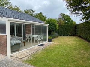 Zahrada ubytování Holiday Home Den Osse by Interhome