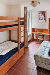 Postel nebo postele na pokoji v ubytování Holiday Home Den Osse by Interhome
