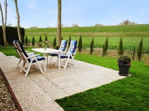 Zahrada ubytování Holiday Home Den Osse by Interhome