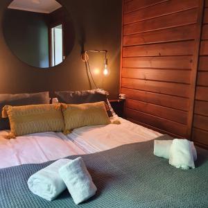 Postel nebo postele na pokoji v ubytování Gargia Lodge