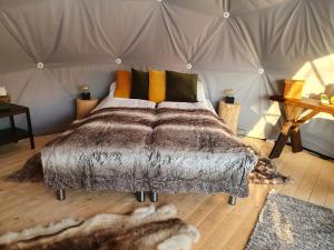 Postel nebo postele na pokoji v ubytování Gargia Lodge