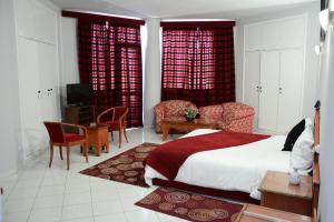 Кровать или кровати в номере Hotel Bouregreg