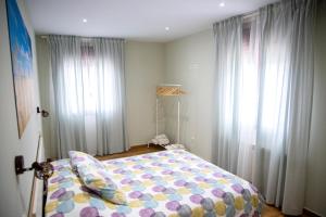 Postel nebo postele na pokoji v ubytování La Casa de los Bisa
