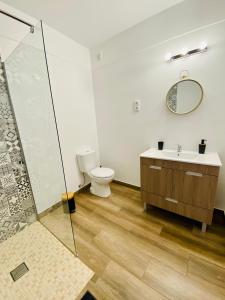 a bathroom with a toilet and a sink at Stay on Top Old Town in Lagos