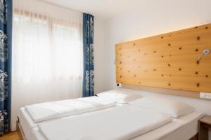 Hapimag Ferienwohnungen Flims客房内的一张或多张床位