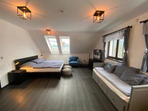 Postel nebo postele na pokoji v ubytování Apartmany Na Salasi