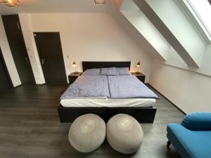 Postel nebo postele na pokoji v ubytování Apartmany Na Salasi