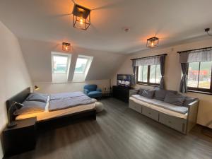 Postel nebo postele na pokoji v ubytování Apartmany Na Salasi
