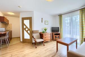 Kuchyňa alebo kuchynka v ubytovaní Apartment Olymp