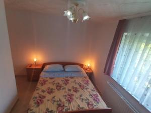Postel nebo postele na pokoji v ubytování Apartment Mara