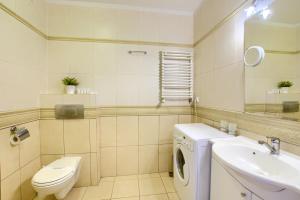 Kúpeľňa v ubytovaní Apartment Olymp