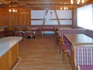 a dining room with a table and chairs at Holiday Home Paznaun - KPL115 by Interhome in Kappl