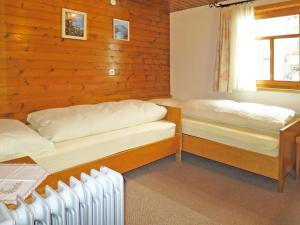 Posteľ alebo postele v izbe v ubytovaní Holiday Home Haus Hermann by Interhome