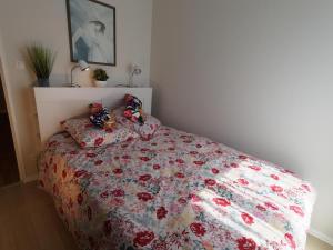 Katil atau katil-katil dalam bilik di COLMAR SWEET HOME