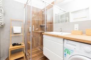 Kúpeľňa v ubytovaní Deluxe Apartments Sucha Gdańsk by Noclegi Renters