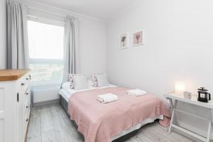 Posteľ alebo postele v izbe v ubytovaní Deluxe Apartments Sucha Gdańsk by Noclegi Renters