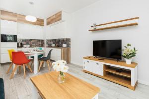 Kuchyňa alebo kuchynka v ubytovaní Deluxe Apartments Sucha Gdańsk by Noclegi Renters + 37 fotografií