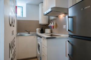Kuchyň nebo kuchyňský kout v ubytování Top Alfama Appartment