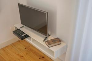TV a/nebo společenská místnost v ubytování Top Alfama Appartment