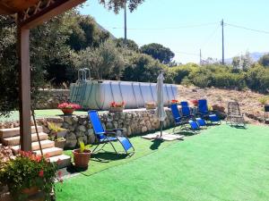 Vonkajšia záhrada v ubytovaní Lomarchi Holiday Home