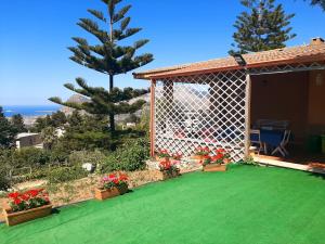 Vonkajšia záhrada v ubytovaní Lomarchi Holiday Home