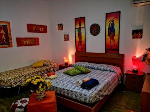 A bed or beds in a room at Villa Loriand