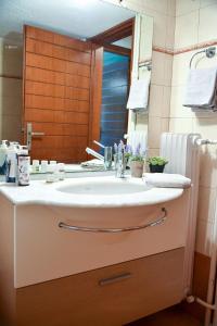 Koupelna v ubytování Homie Apartment next to Acropolis