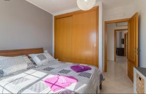 A bed or beds in a room at Villa Las Bahías