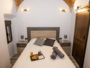 Posteľ alebo postele v izbe v ubytovaní Elegante Apartamento para 5 en el centro de Cáceres con wifi